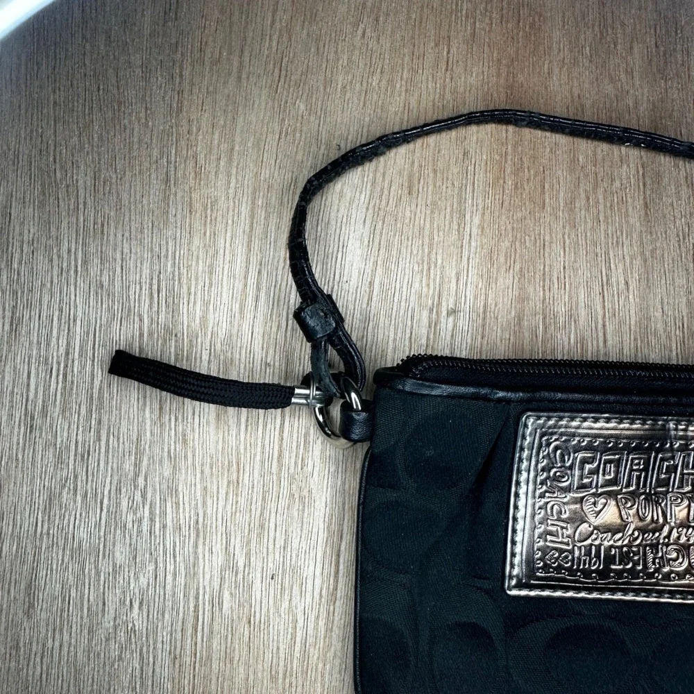 Coach Poppy Black Signature C Wristlet Pouch Bag Silver Logo